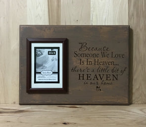 Memorial wooden sign with because someone we love is in heaven quote
