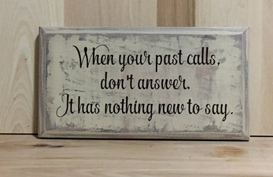 When your past calls, don't answer.  It has nothing new to say wood sign.