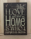What I love most about my home is who I share it with wood sign.