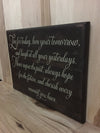 Inspirational wooden sign for home or office decor.