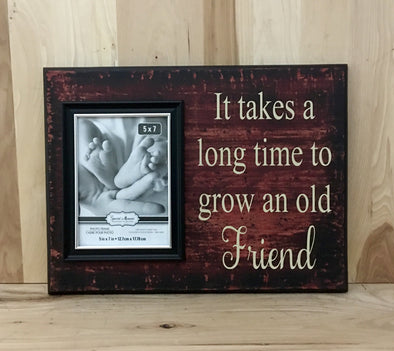 It takes a long time to grow an old friend wood sign with frame.