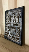 Don't squat with your spurs on western wood sign.