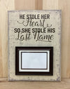 He stole her heart, so she stole his last name wood sign with attached picture frame.