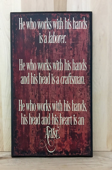 An artist works with his hands, head and heart wooden sign.