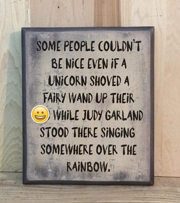 Some people couldn't be nice even if a unicorn shoved a fairy wand up wood sign.