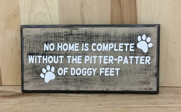 No home is complete without the pitter-patter of doggy feet wood sign.