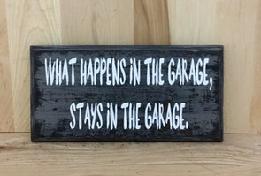 What happens in the garage stays in the garage wood sign.