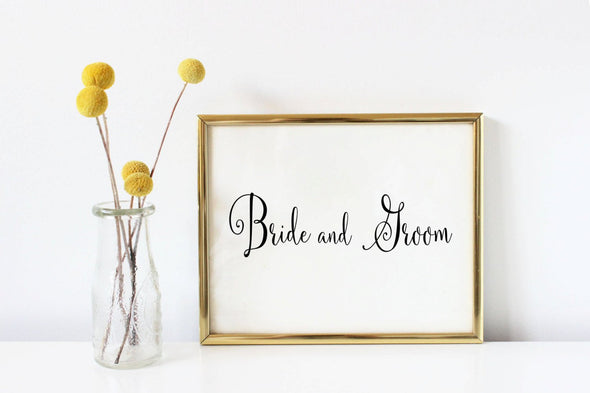 Bride and groom sign for wedding.