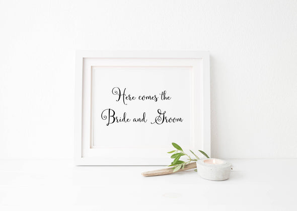 Digital download here comes the bride and groom wedding sign.