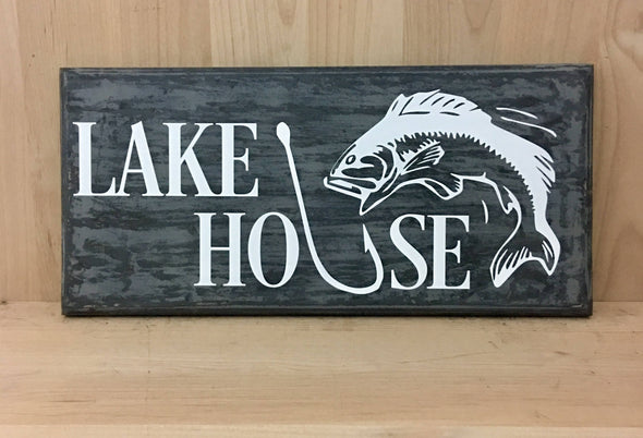 Lake house sign with fish design and hook wood sign.