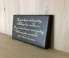 Custom wood sign with integrity quote.