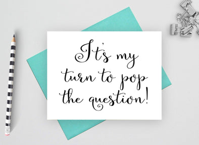 It's my turn to pop the question card for maid of honor or bridesmaid.