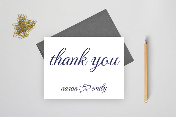 Wedding thank you cards personalized with the couple's names.