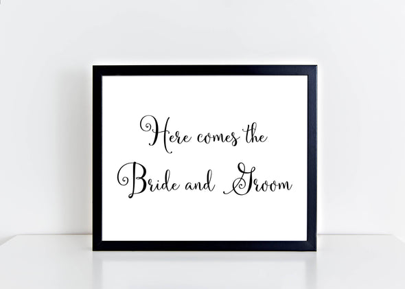Here comes the bride and groom wedding sign.