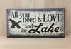 All you need is love and the lake wood sign for cabin decor or man cave.