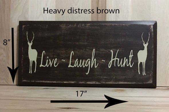 17x8 heavy distress brown hunting sign with cream lettering.
