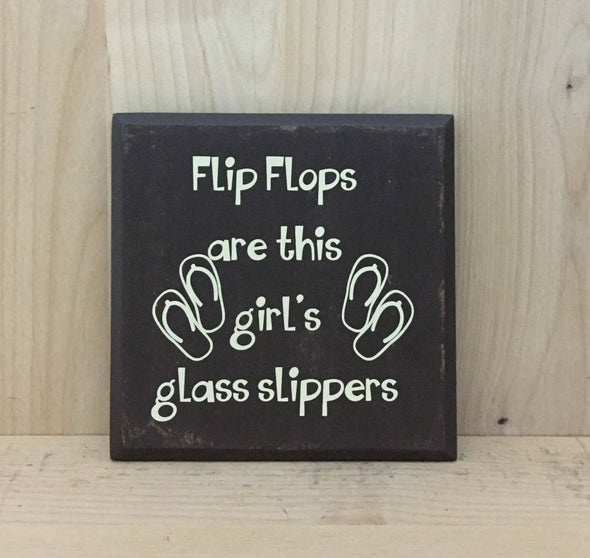 Flip flops are this girl's glass slippers wood sign.
