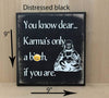 9x9 distressed black funny wood sign with white lettering.
