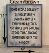 11x9 cream/brown funny wood sign with brown lettering.