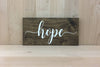 Calligraphy hope wooden sign for home decorating.