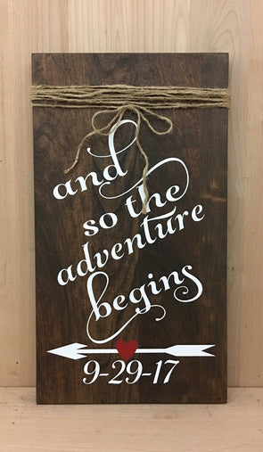 And so the adventure begins personalized wedding sign with arrow and heart.