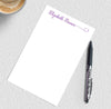Women's personalized notepad with flourish.
