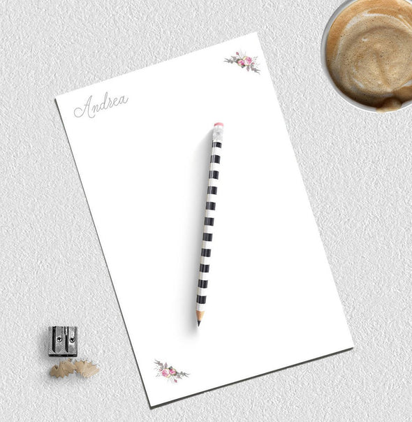 Floral design in corners personalized notepad.