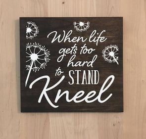 When life get to hard to stand kneel religious wood sign with daisy designs.