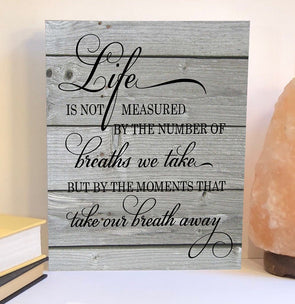 Life is not measured by the breaths we take wood sign