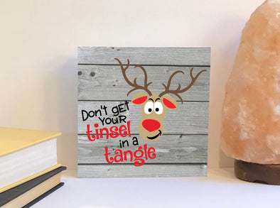 Don't get your tinsel in a tangle wood sign