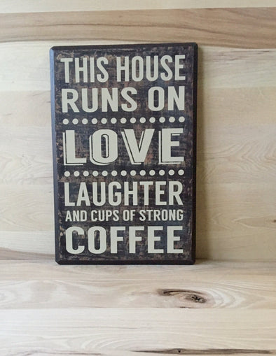 This house runs on love laughter and cups of strong coffee wood sign