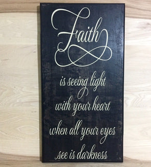 Faith is seeing light with your heart when all your eyes see is darkness sign.