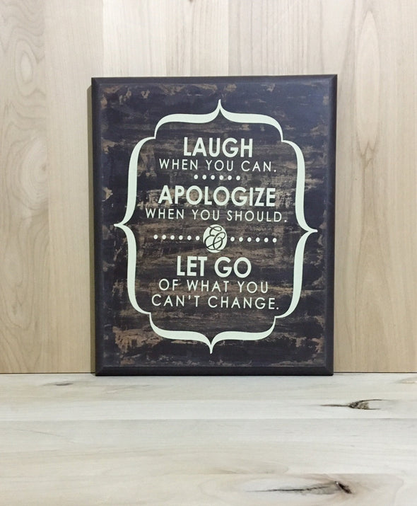 Laugh, apologize, let go custom wood sign.