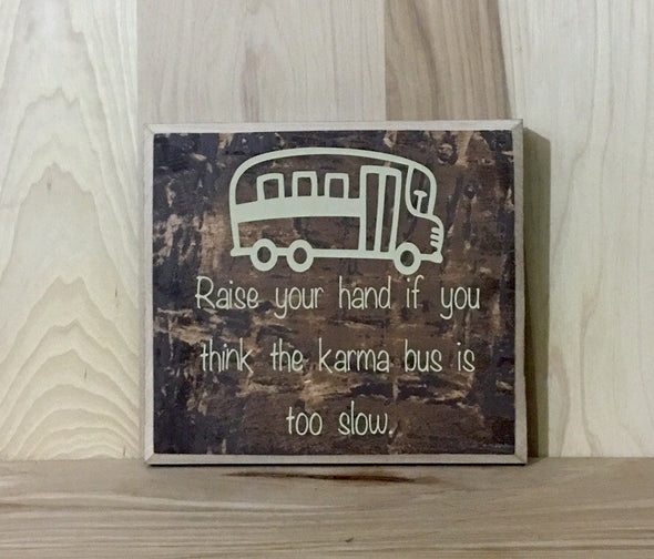 Raise your hand if you think the karma bus is too slow wood sign.