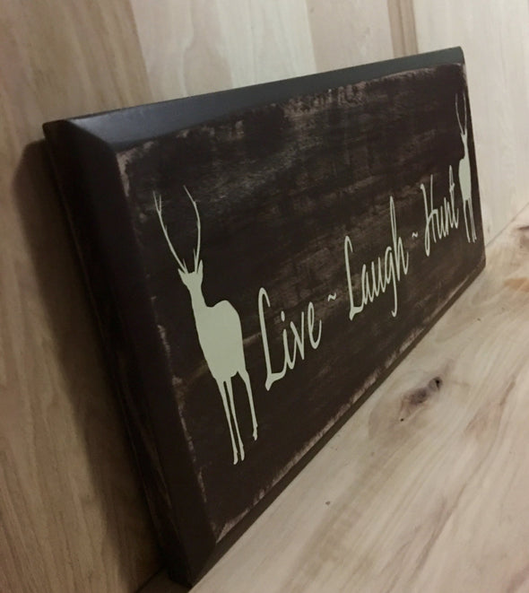 Fun live laugh hunt wood sign for cabin decor or man cave.