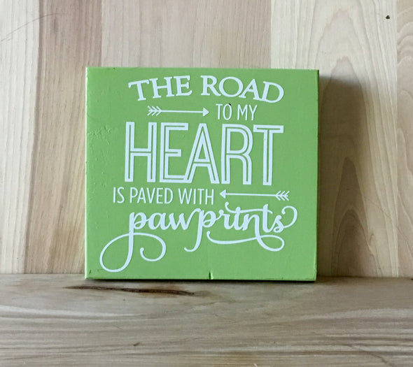 The road to my heart wood sign