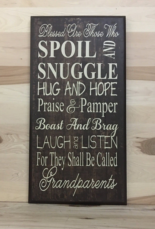 Blessed are those who spoil and snuggle hug and hope praise and pamper, grandparents sign.