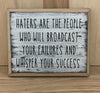Haters wood sign with saying