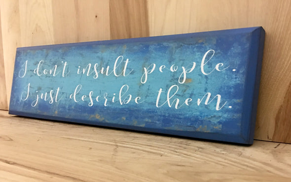 Insulting people custom wood sign with script lettering.