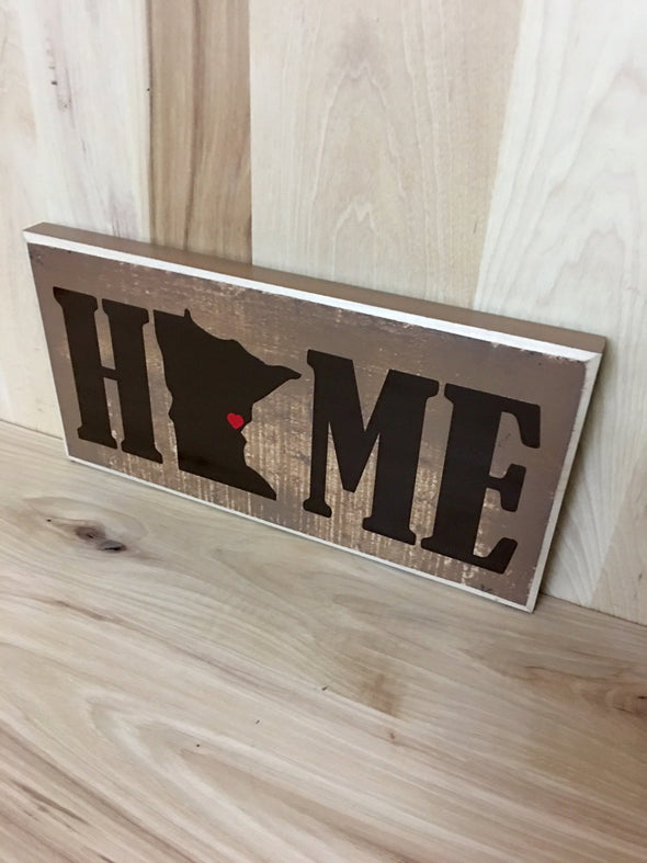 Personalized home wood sign with state shape.