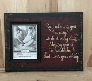 Remembering you is easy memorial sign with picture frame.