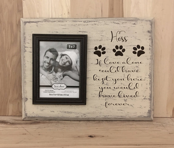 Personalized dog memorial wood sign with attached picture frame.