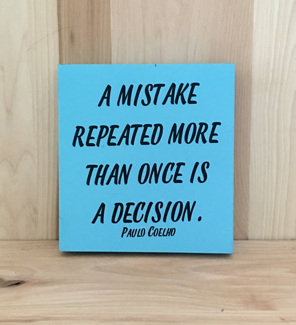 A mistake repeated more than once is a decision wood sign.